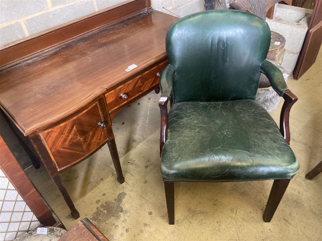 An Edwardian mahogany and satinwood banded shaped front dressing table, width 120cm, depth 58cm, height 84cm together with a green leat